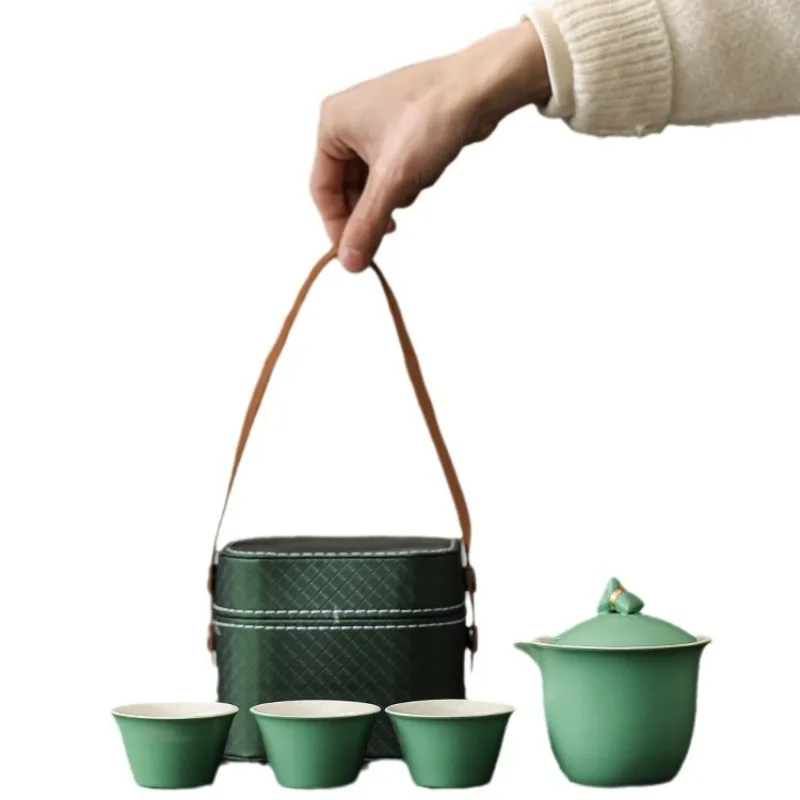 Portable outdoor express cup, one pot, three cups of ceramic Kung Fu tea drinking travel set
Portable outdoor express cup, one pot, three cups of ceramic Kung Fu tea drinking travel set