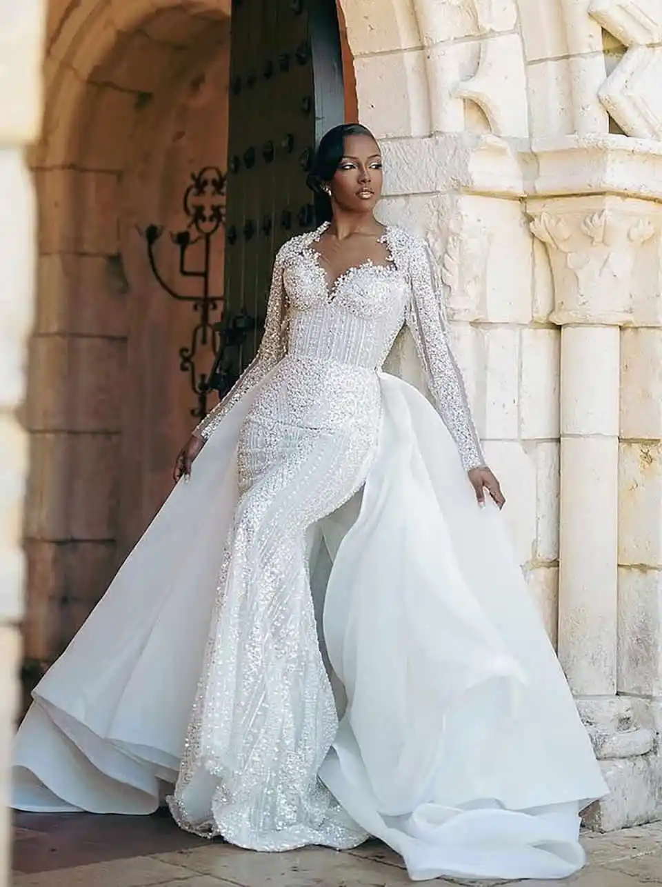 Customized Sheer Neck Sparkly Heavy Beads Crystals Mermaid Wedding Dress with Removable Skirt Long Sleeves Luxury Bridal Gowns
Customized Sheer Neck Sparkly Heavy Beads Crystals Mermaid Wedding Dress with Removable Skirt Long Sleeves Luxury Bridal Gowns