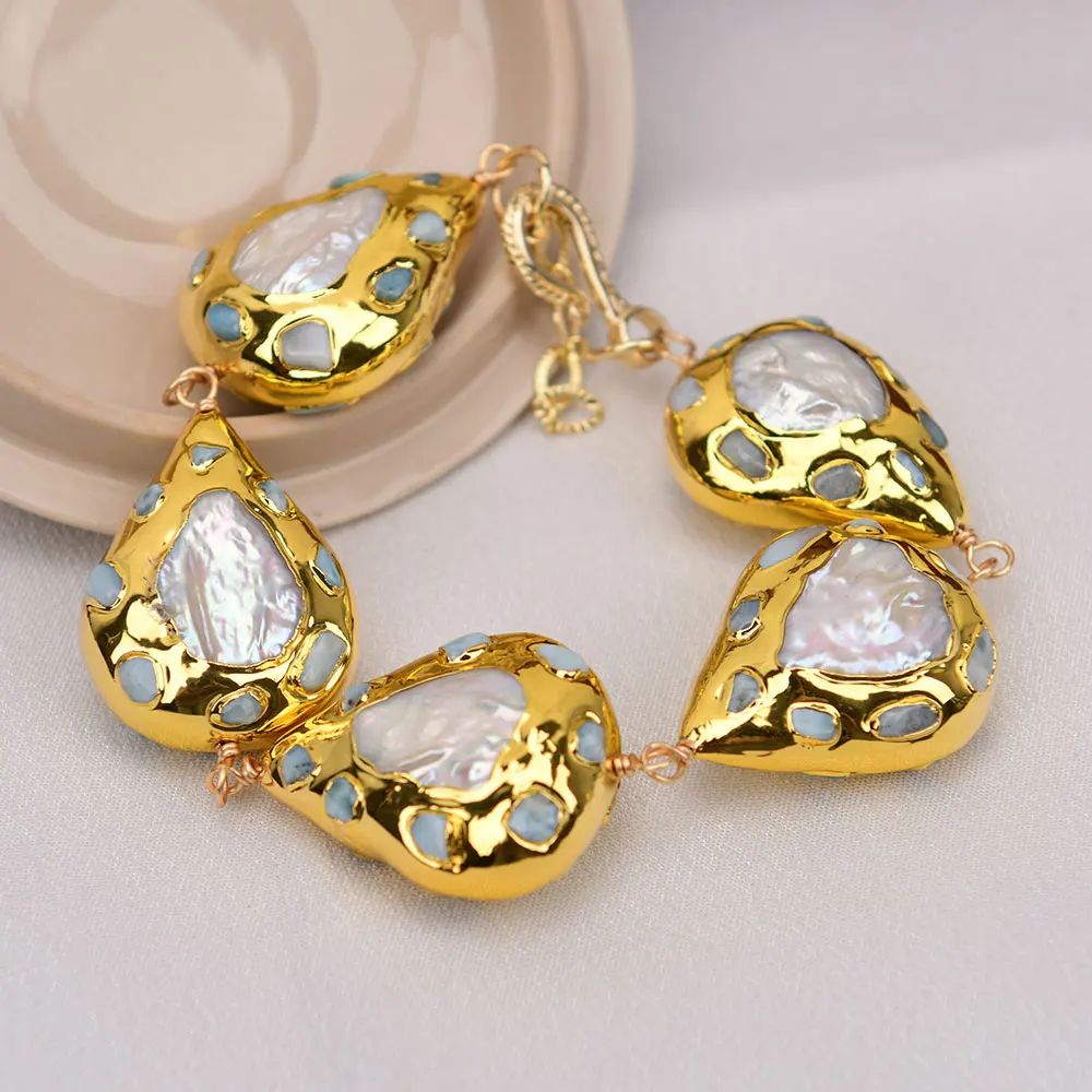 GG Natural Blue larimar Stone Paved Gold Plated White Coin Pearl Beads Chain Bracelet
GG Natural Blue larimar Stone Paved Gold Plated White Coin Pearl Beads Chain Bracelet