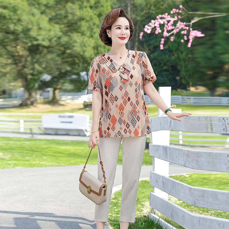 Summer 2 Piece Sets Woman Summer Chiffon lapel printing Blouses Tops and Cotton and linen capri pants Woman Suit
Summer 2 Piece Sets Woman Summer Chiffon lapel printing Blouses Tops and Cotton and linen capri pants Woman Suit