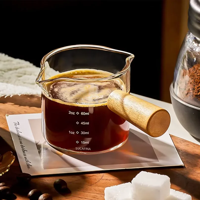 1pc Glass Measuring Cup Wood Handle Glass Espresso Measuring Cup Double Single Mouth Milk Coffee Clear Mug Coffee Supplies
1pc Glass Measuring Cup Wood Handle Glass Espresso Measuring Cup Double Single Mouth Milk Coffee Clear Mug Coffee Supplies