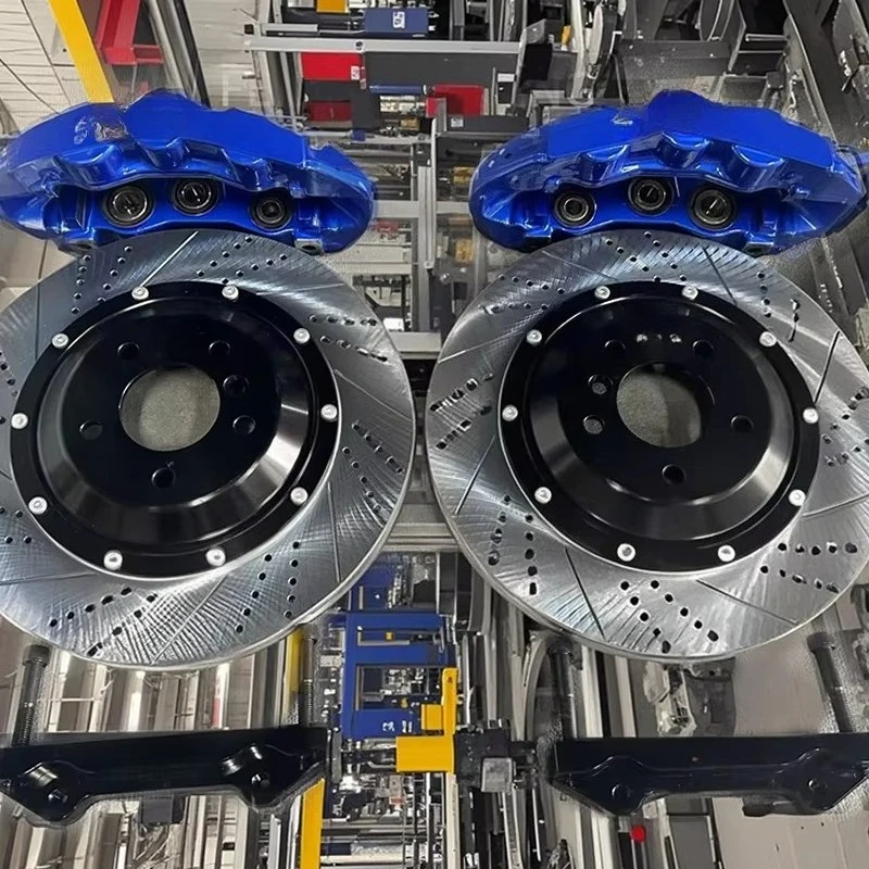 Wholesale High quality Upgraded 9200 4 Pot Brake Caliper Kit With Slotted Drilled Racing Car Brake System Parts Disc Pads Set
Wholesale High quality Upgraded 9200 4 Pot Brake Caliper Kit With Slotted Drilled Racing Car Brake System Parts Disc Pads Set