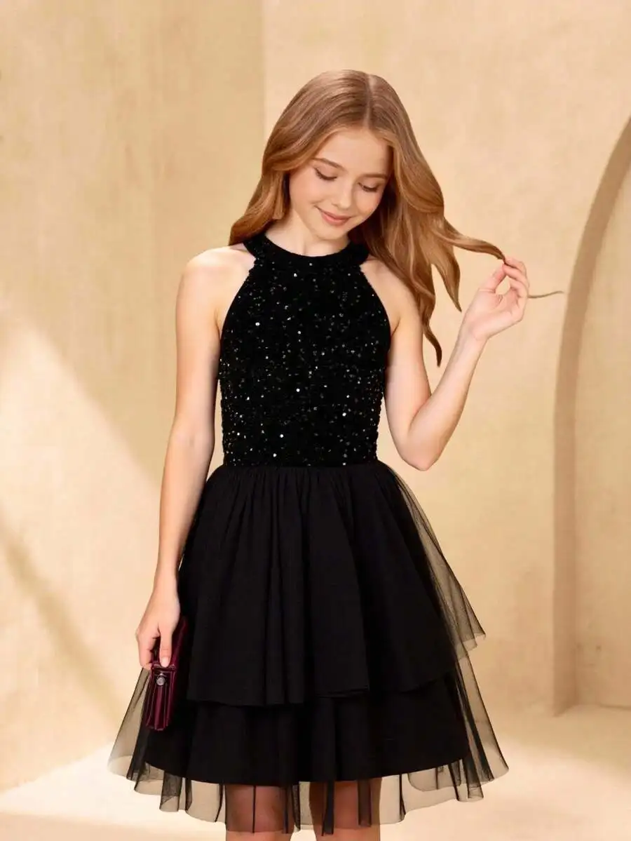 Black Sequined Halter Neck Evening Dress With Tiered Tulle Skirt For Formal Occasion
Black Sequined Halter Neck Evening Dress With Tiered Tulle Skirt For Formal Occasion