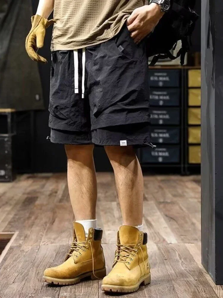 Мужские короткие брюки с карманами, мешковатые свободные бермуды с эластичной резинкой на талии, мужские шорты-карго, черные однотонные длинные широкие полуновые шорты 
Мужские короткие брюки с карманами, мешковатые свободные бермуды с эластичной резинкой на талии, мужские шорты-карго, черные однотонные длинные широкие полуновые шорты
