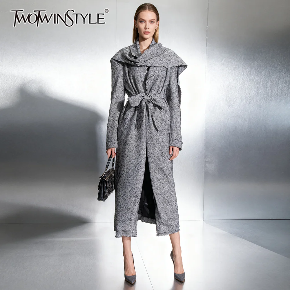 TWOTWINSTYLE Fashion Spliced Lace Up Design Sense Trenchs for Women Lapel Long Sleeve Patchwork Ribbon Temperament Trench Female
TWOTWINSTYLE Fashion Spliced Lace Up Design Sense Trenchs for Women Lapel Long Sleeve Patchwork Ribbon Temperament Trench Female