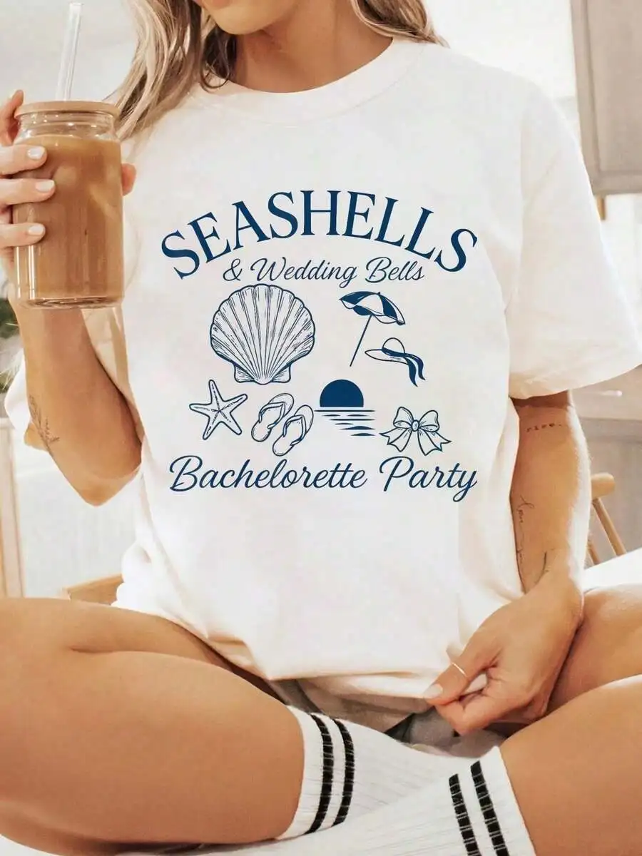 Seashells And Wedding Bells Bachelorette Beach T-Shirt Round Neck Short Sleeve Cotton Tee Casual Summer All Season
Seashells And Wedding Bells Bachelorette Beach T-Shirt Round Neck Short Sleeve Cotton Tee Casual Summer All Season