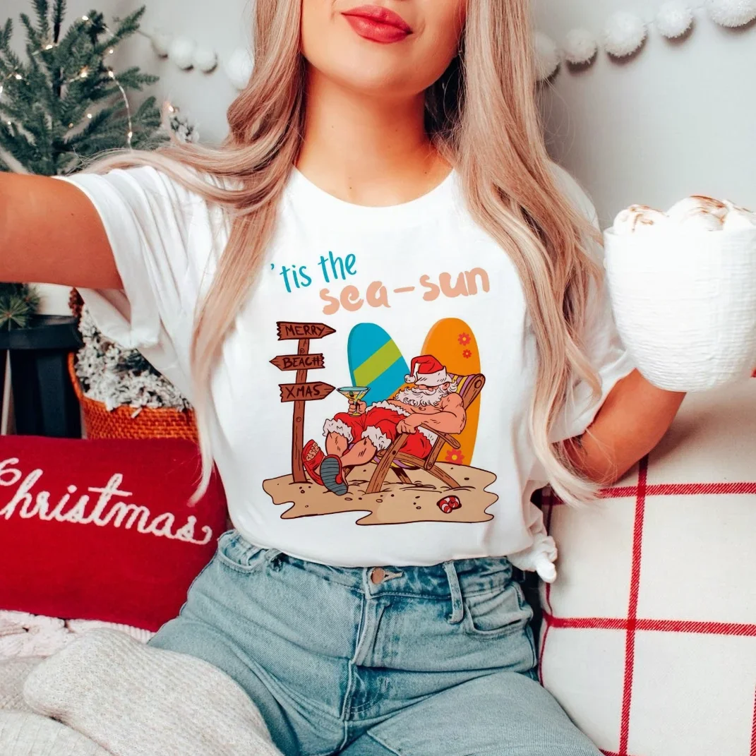 Tis The Sea Sun Merry Beach Рождественская футболка с графическим рисунком Рождественская мода 90-х годов Стиль с принтом и круглым вырезом Новогодняя повседневная женская свободная футболка
Tis The Sea Sun Merry Beach Рождественская футболка с графическим рисунком Рождественская мода 90-х годов Стиль с принтом и круглым вырезом Новогодняя повседневная женская свободная футболка