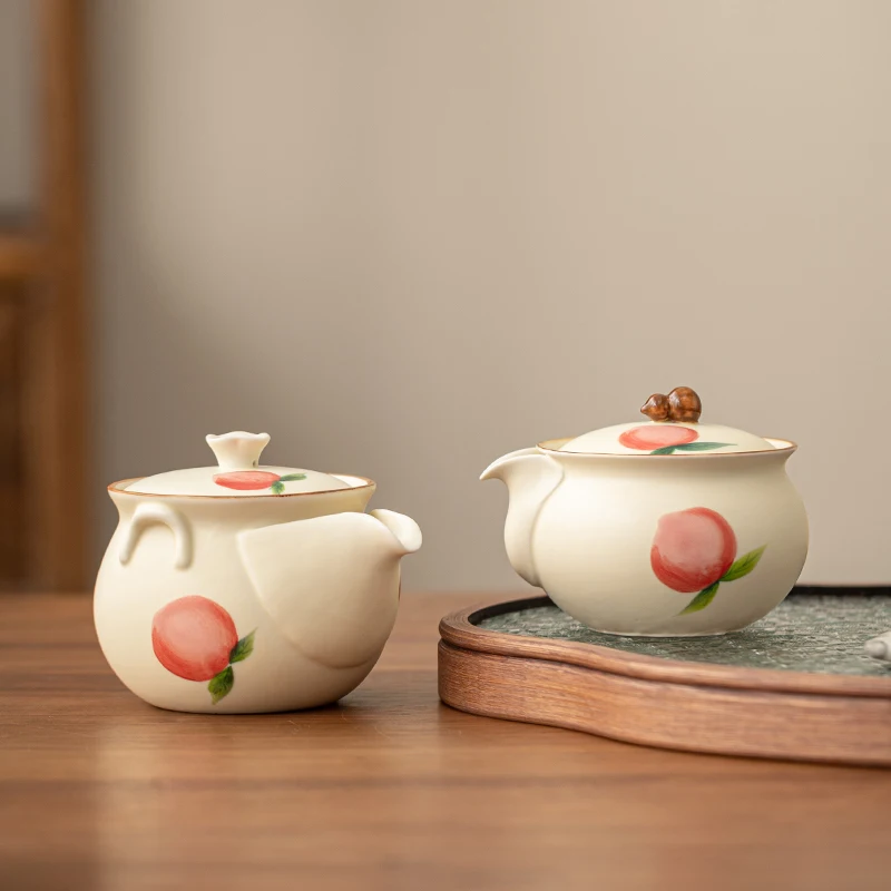 Chinese Ceramic Teapot Handmade Peach Pattern Tea Pot Teacup Household Hand Grab Pot Beauty Tea Infuser Kettle Travel Teaware
Chinese Ceramic Teapot Handmade Peach Pattern Tea Pot Teacup Household Hand Grab Pot Beauty Tea Infuser Kettle Travel Teaware