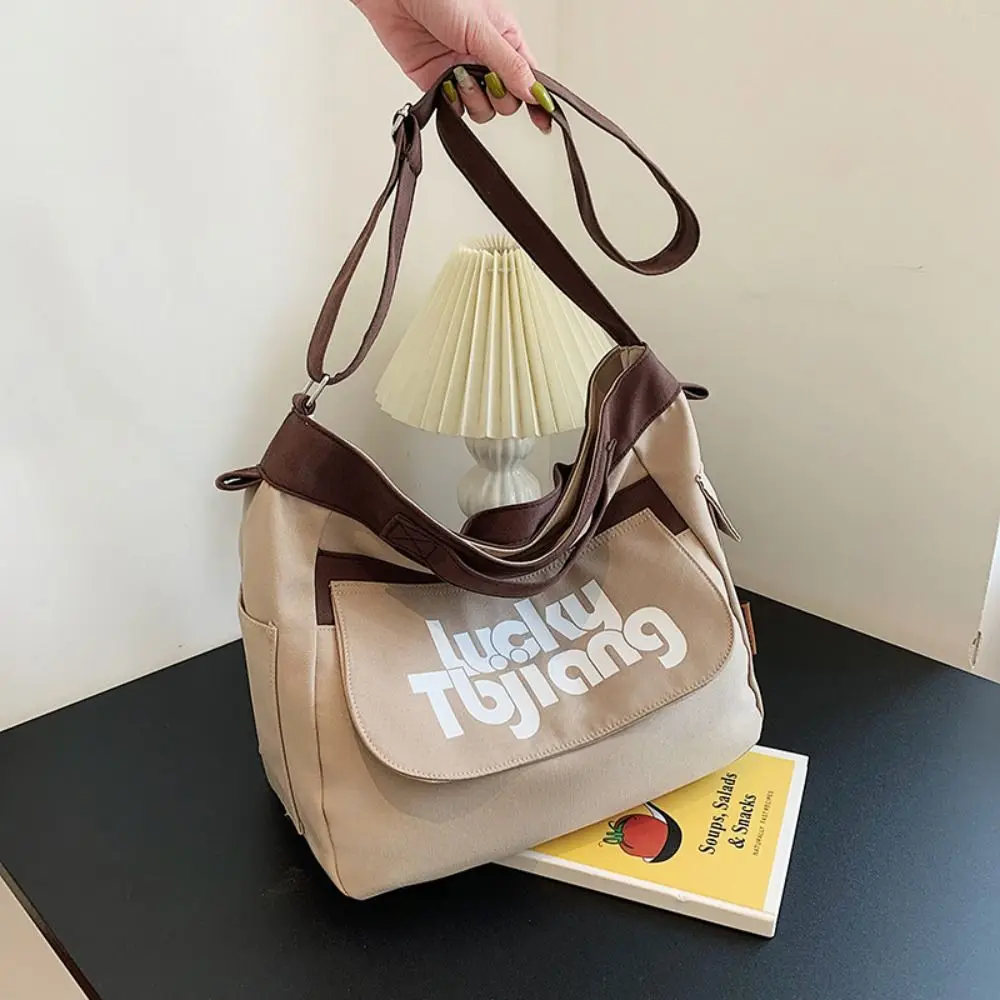 Leisure Large Capacity Canvas Bag Letter Printed Shopping Tote Letter Shoulder Bag Simple Commute Cloth Crossbody Bag Girls
Leisure Large Capacity Canvas Bag Letter Printed Shopping Tote Letter Shoulder Bag Simple Commute Cloth Crossbody Bag Girls