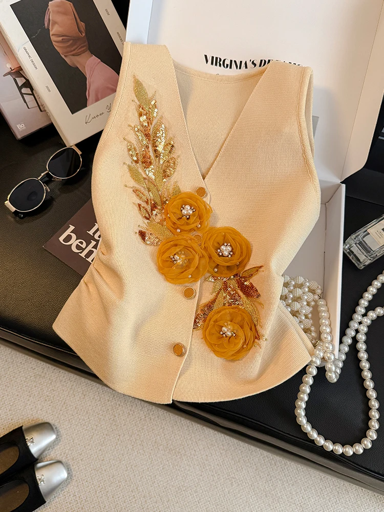 New fashion V-neck pleated waist slimming suit vest flower decoration top
New fashion V-neck pleated waist slimming suit vest flower decoration top