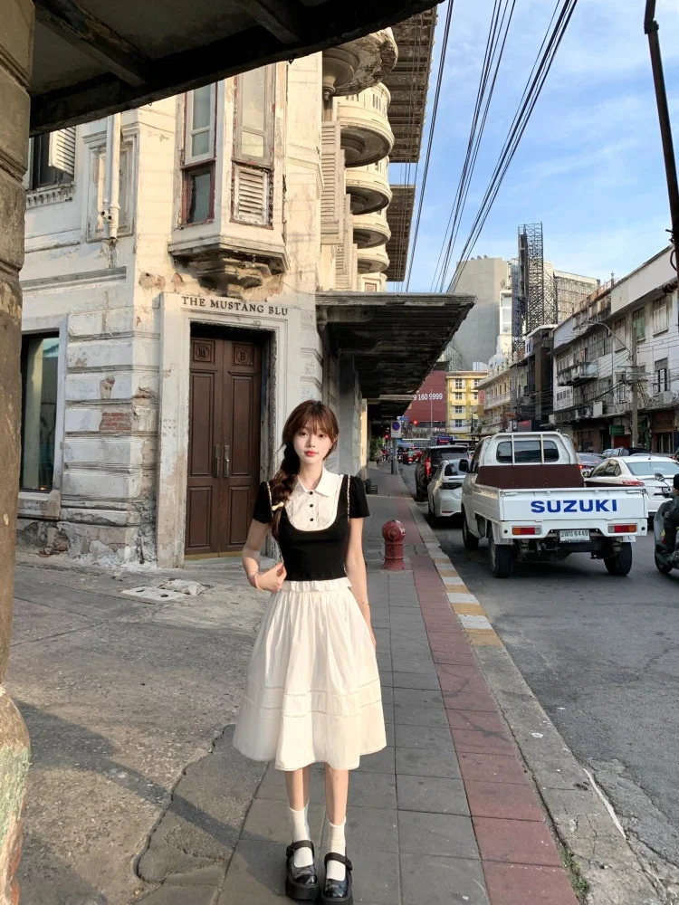 College Style Women's Summer Outfit 2026 New T-Shirt Skirt Set Short Sleeve Neck High Waist Uniform Color Pure Summer OOTD
College Style Women's Summer Outfit 2026 New T-Shirt Skirt Set Short Sleeve Neck High Waist Uniform Color Pure Summer OOTD