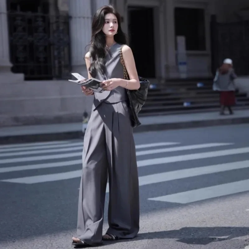 Temperament Fashion Suit Vest Wide Leg Pants Two-piece Set Women V-neck Irregular Shirring Sleeveless Solid Slim Summer Wear New
Temperament Fashion Suit Vest Wide Leg Pants Two-piece Set Women V-neck Irregular Shirring Sleeveless Solid Slim Summer Wear New