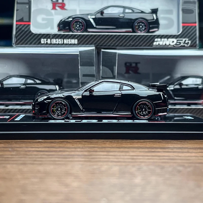 INNO 1:64 GT-R R35 NISMO модель автомобиля из сплава, статическая коллекция, украшенные праздничные подарки, игрушки 
INNO 1:64 GT-R R35 NISMO модель автомобиля из сплава, статическая коллекция, украшенные праздничные подарки, игрушки