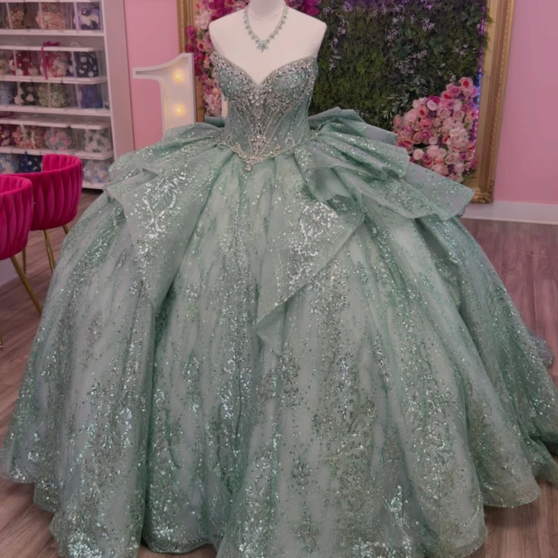 Mint Green Shiny Ball Gown Quinceanera Dresses Sequin Applique Lace Beading Crystal Bow Tiered Tull Corset Off The Shoulder
Mint Green Shiny Ball Gown Quinceanera Dresses Sequin Applique Lace Beading Crystal Bow Tiered Tull Corset Off The Shoulder
