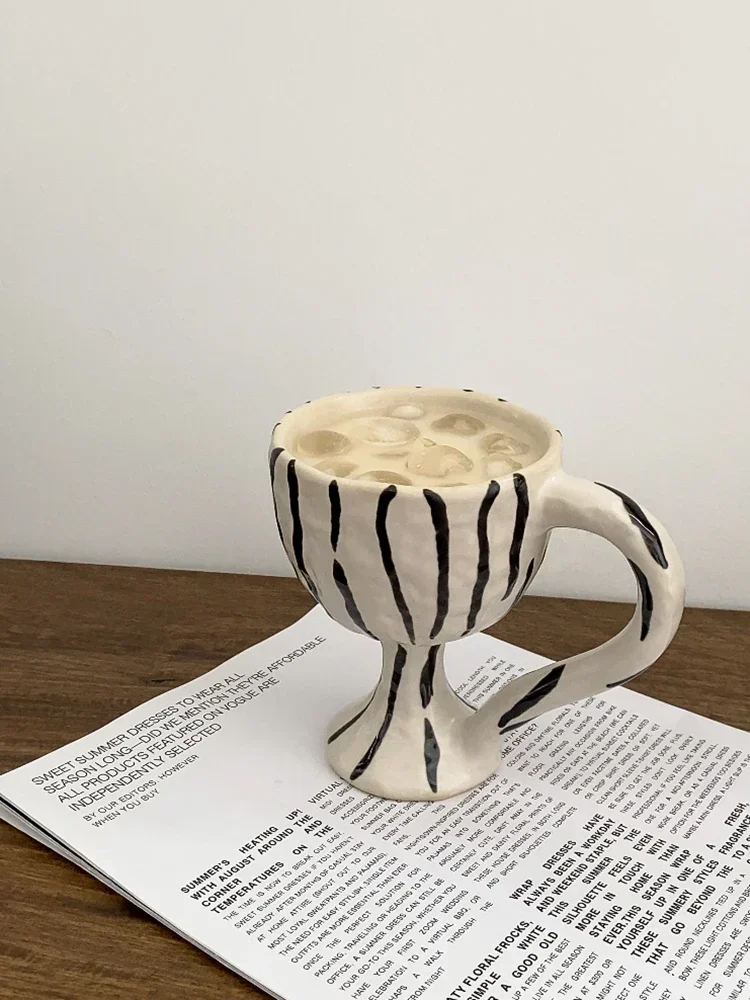 Korean classic hand-indentation ceramic coffee breakfast milk cup interesting gift stripes leopard decorative cup
Korean classic hand-indentation ceramic coffee breakfast milk cup interesting gift stripes leopard decorative cup