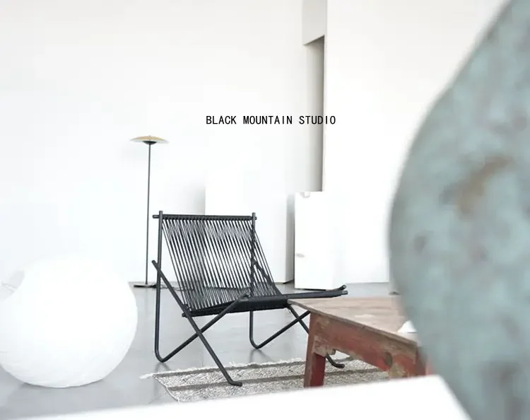 Minimalist leisure chair creative low sofa black medieval balcony braided rope
Minimalist leisure chair creative low sofa black medieval balcony braided rope