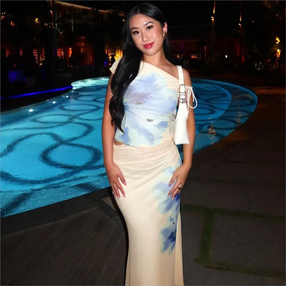 Summer Fashion Skirt Set Printed Beach Resort Style Sleeveless Lace-up Top High-waisted Lace Trim Long Skirt Two-piece Set
Summer Fashion Skirt Set Printed Beach Resort Style Sleeveless Lace-up Top High-waisted Lace Trim Long Skirt Two-piece Set