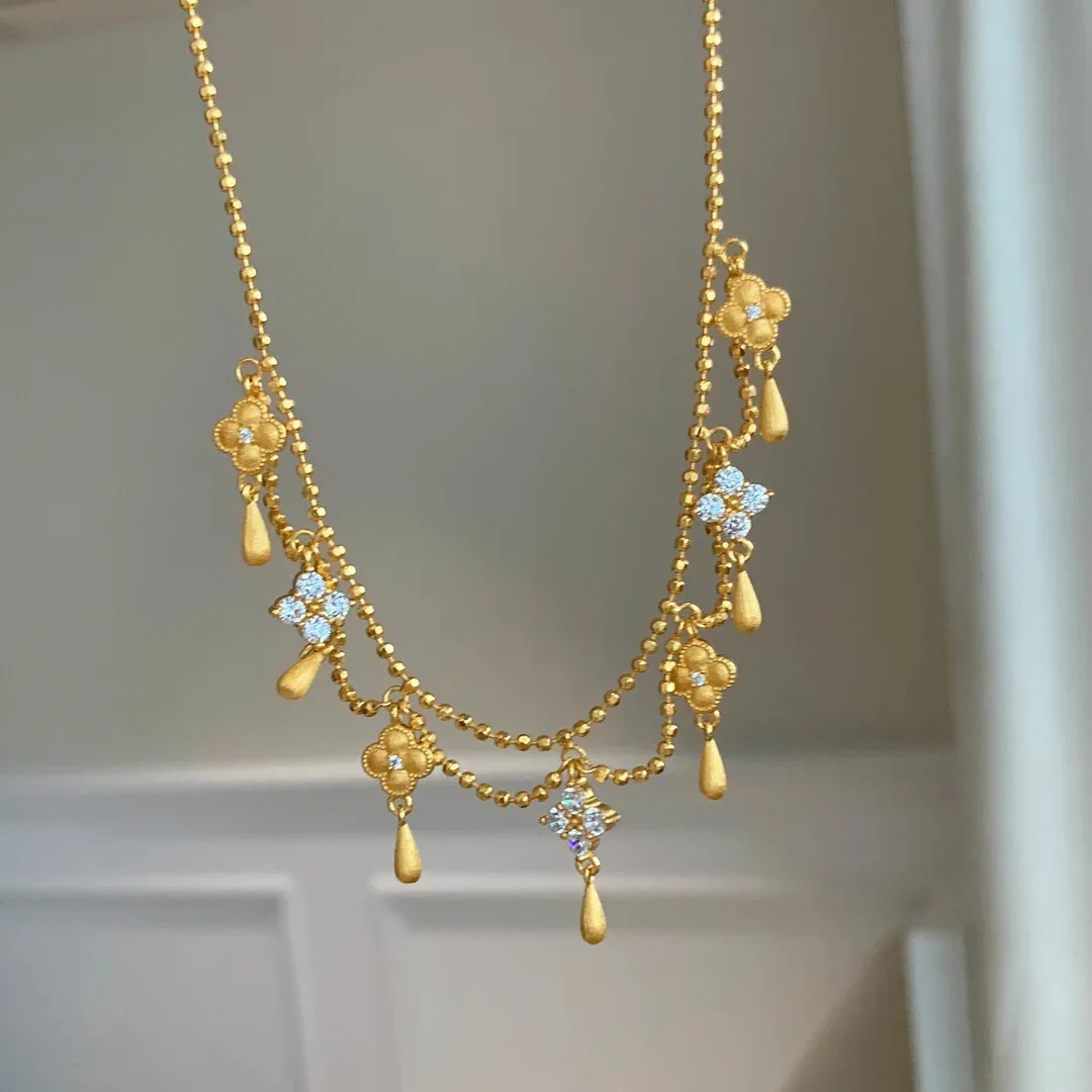 Vintage Frenchinspired Water Droplet Tassel FourLeaf Clover Necklace for Women Elegant Luxe Princess Style Chain
Vintage Frenchinspired Water Droplet Tassel FourLeaf Clover Necklace for Women Elegant Luxe Princess Style Chain