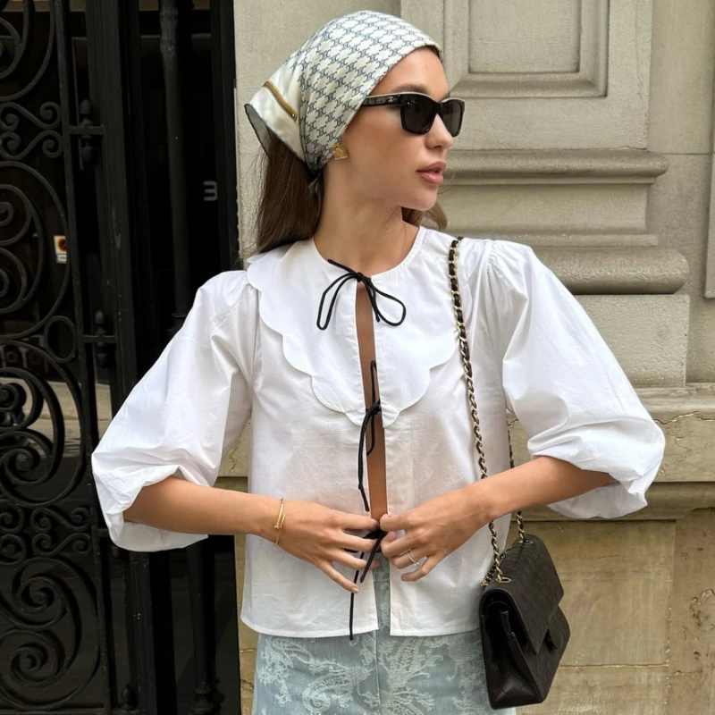 European and American Fashion French White Pure Cotton Doll Collar Puff Sleeve Tied Shirt
European and American Fashion French White Pure Cotton Doll Collar Puff Sleeve Tied Shirt