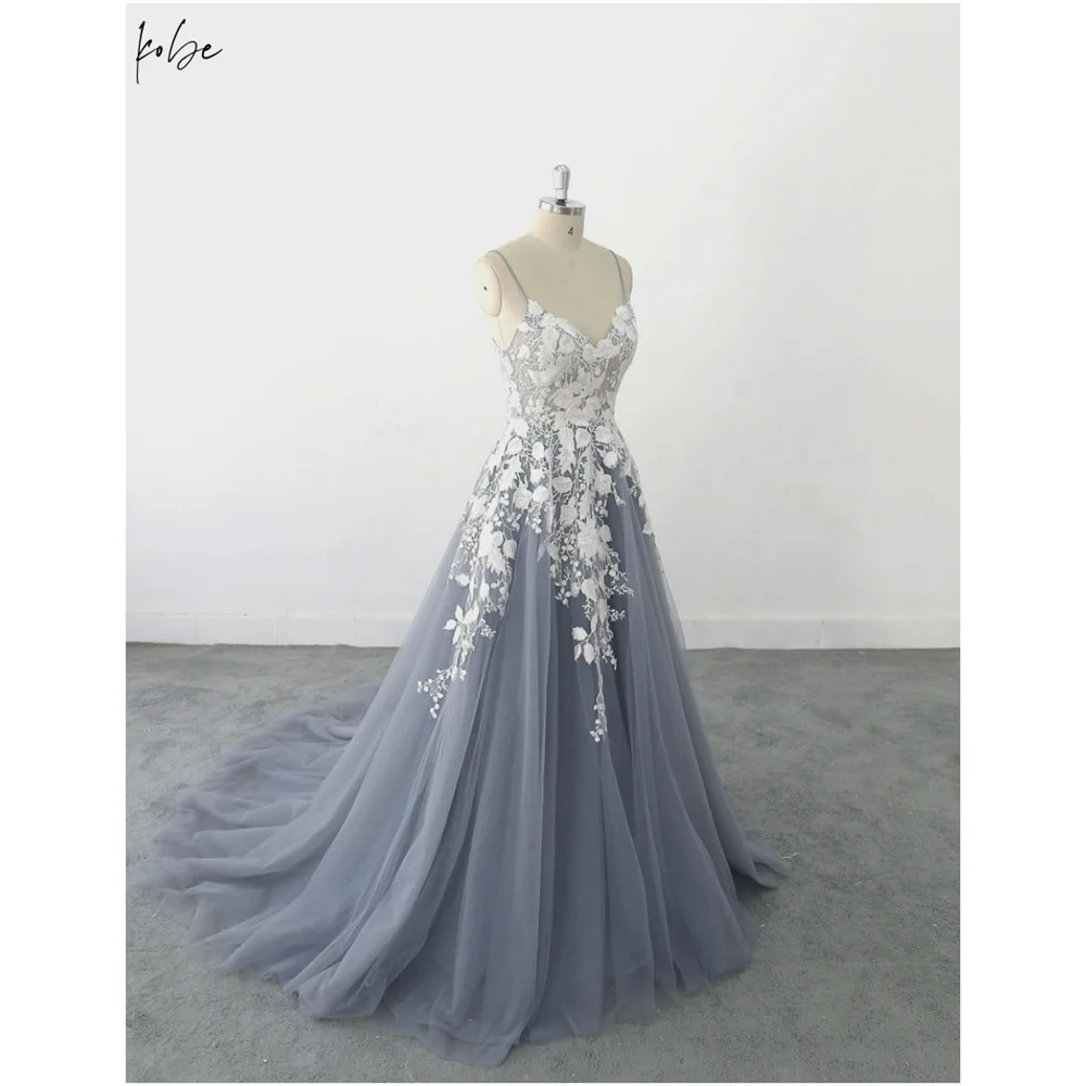 Kobe White V-Neck Ball Gown Evening Dresses Spaghetti Strap Tulle Party Dresses Embroidery Backless Customized Prom Dresses 2025
Kobe White V-Neck Ball Gown Evening Dresses Spaghetti Strap Tulle Party Dresses Embroidery Backless Customized Prom Dresses 2025