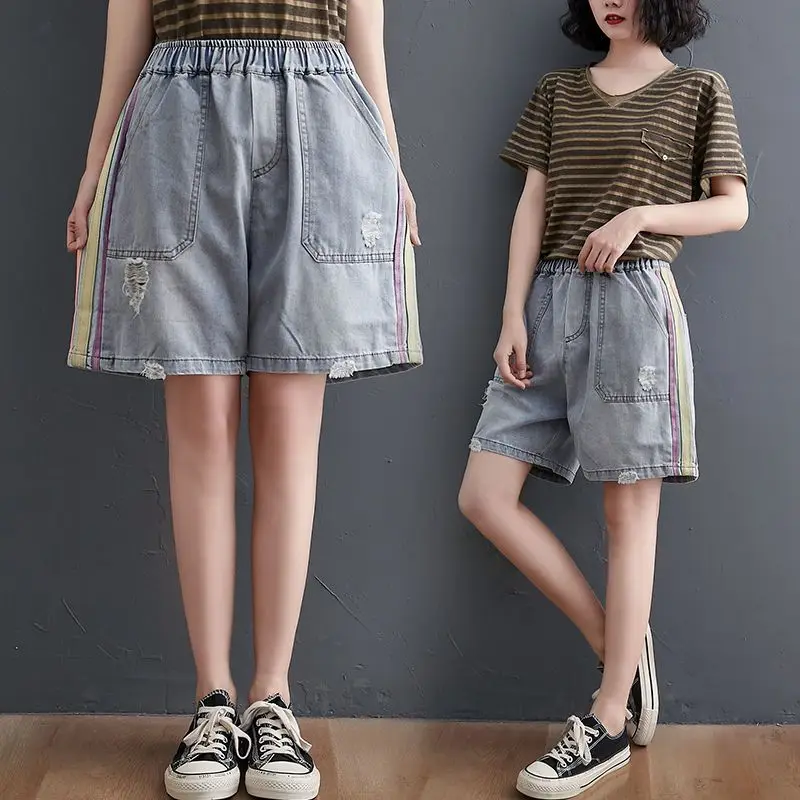 Summer new thin denim jeans women's retro side contrasting color stripes elastic high waist loose straight leg denim shorts
Summer new thin denim jeans women's retro side contrasting color stripes elastic high waist loose straight leg denim shorts