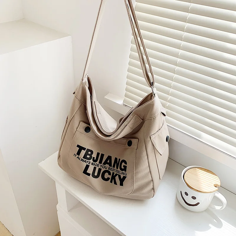 Korean Sle Canvas oulder Bag Women's Large Capaci Diagonal Bags Faionable College Sle Letter Bapa New Model
Korean Sle Canvas oulder Bag Women's Large Capaci Diagonal Bags Faionable College Sle Letter Bapa New Model