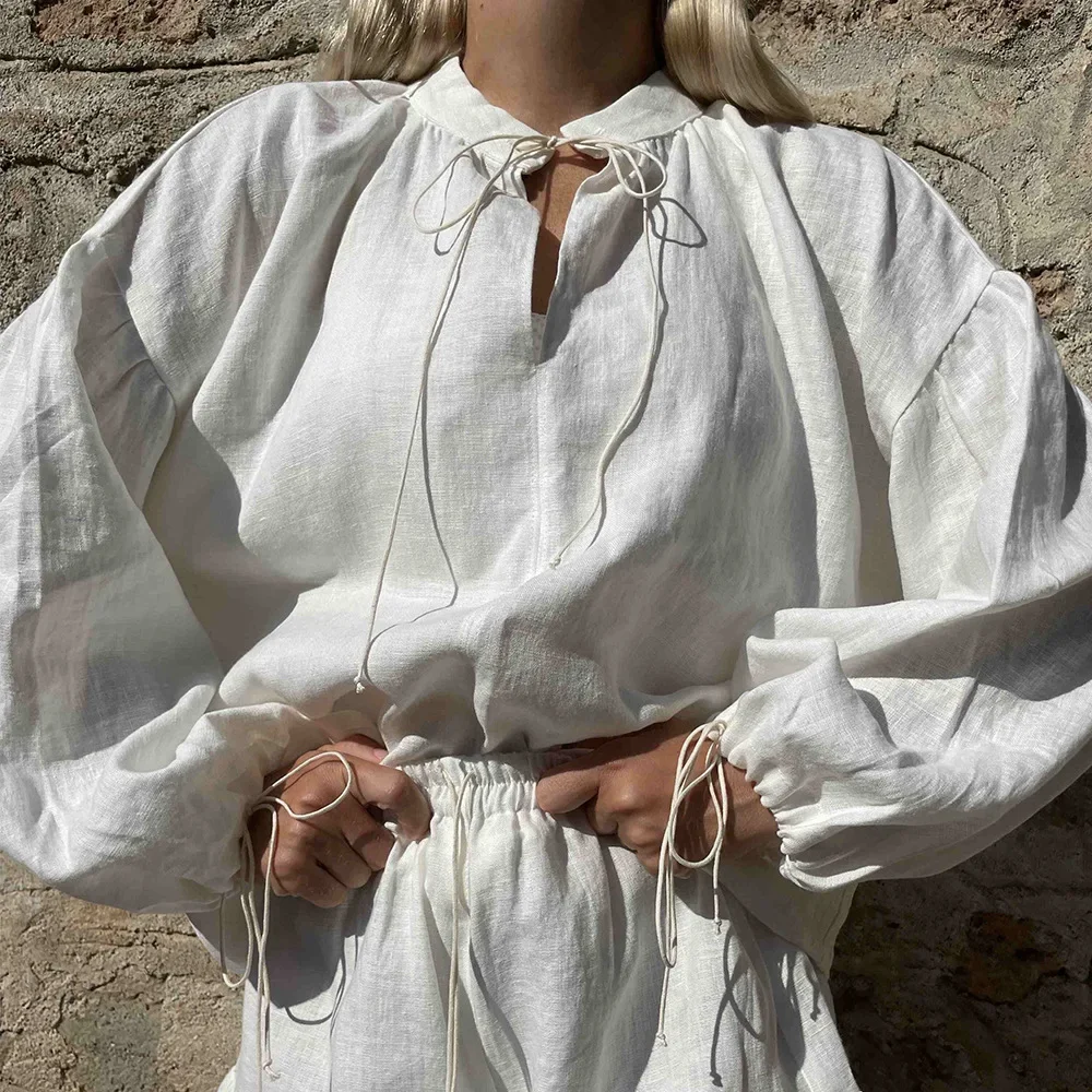 2026 Spring Summer New Long Sleeved Shorts Set Lace Up Lantern Sleeves Top Pleated Elastic Waisted Shorts Set Lazy Holiday Style
2026 Spring Summer New Long Sleeved Shorts Set Lace Up Lantern Sleeves Top Pleated Elastic Waisted Shorts Set Lazy Holiday Style