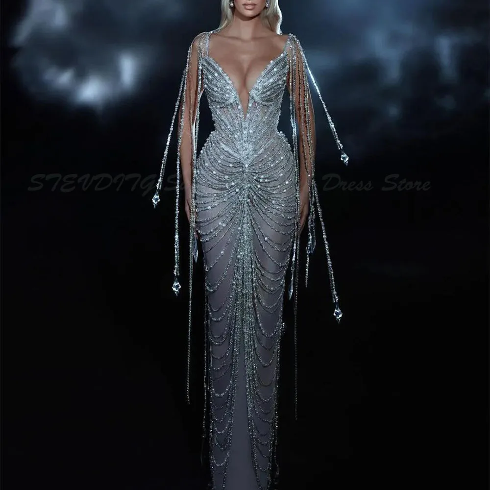 Sexy Mermaid Prom Dresses Sleeveless V Neck Straps Appliques Sequins Beaded Floor Length Diamonds 3D Lace Tassel Evening Dress
Sexy Mermaid Prom Dresses Sleeveless V Neck Straps Appliques Sequins Beaded Floor Length Diamonds 3D Lace Tassel Evening Dress