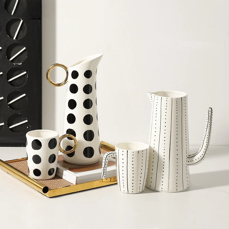 Modern simple hand-painted polka dot ceramic kettle model room ornament, home creative decoration
Modern simple hand-painted polka dot ceramic kettle model room ornament, home creative decoration