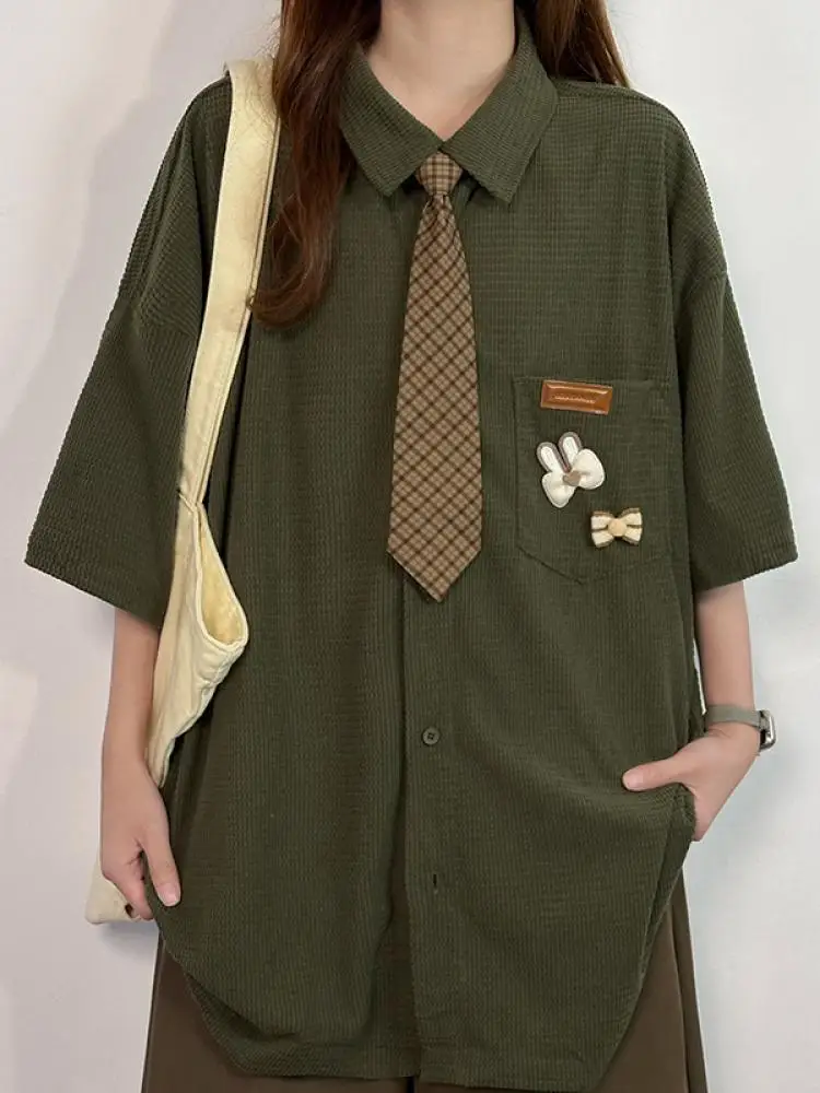 Original Street Style Loose Women's Short Sleeve Shirt with Tie Summer Fashion Retro College Wind Waffle Pattern Casual Top
Original Street Style Loose Women's Short Sleeve Shirt with Tie Summer Fashion Retro College Wind Waffle Pattern Casual Top