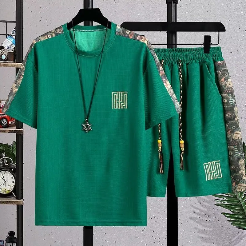 Summer New Fashion Trend Printed Short-Sleeved Shorts Set For Men Loose Sports Breathable Large Size High-Grade Two-Piece Set
Summer New Fashion Trend Printed Short-Sleeved Shorts Set For Men Loose Sports Breathable Large Size High-Grade Two-Piece Set