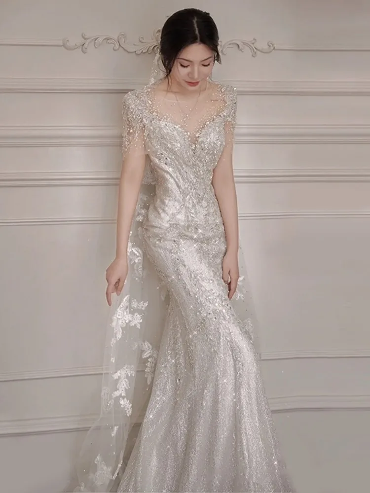 A new light luxury fishtail mini dress with tulle tail for toasting
A new light luxury fishtail mini dress with tulle tail for toasting