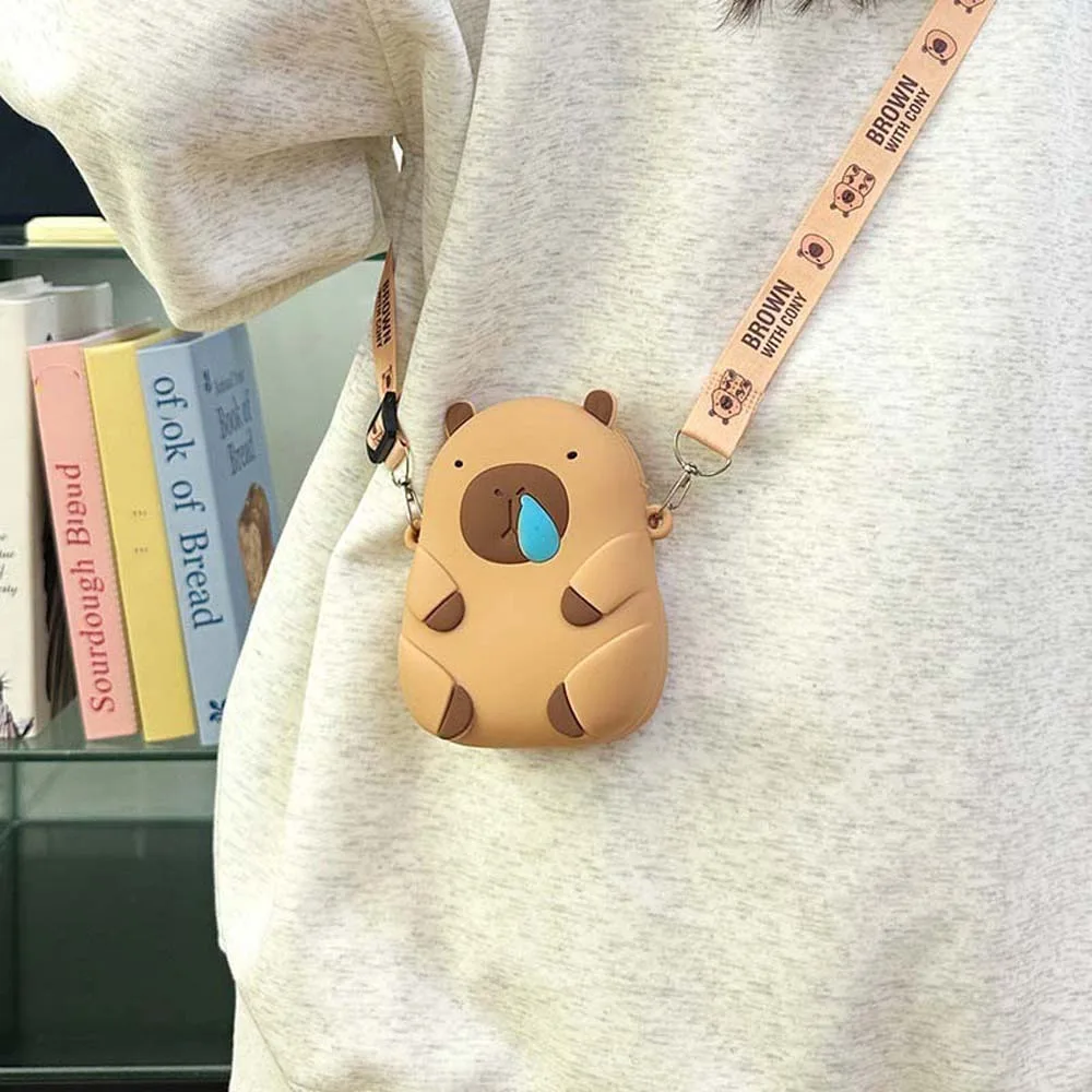 Kawaii капибара сумка через плечо мультфильм регулируемые ремни силиконовая сумка для куклы маленькая водонепроницаемая детская маленькая сумочка друзья
Kawaii капибара сумка через плечо мультфильм регулируемые ремни силиконовая сумка для куклы маленькая водонепроницаемая детская маленькая сумочка друзья