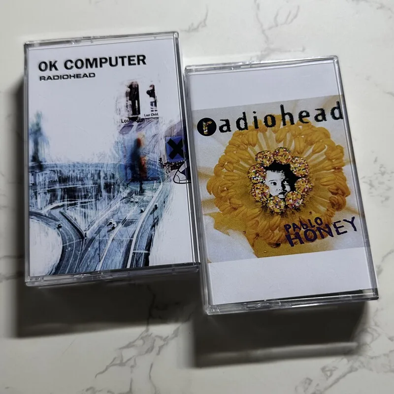 Radiohead Pablo Honey OK Computer Cassette Tape 2Pcs Set with Lyric Booklet, Classic Rock Band Collectible for Fans
Radiohead Pablo Honey OK Computer Cassette Tape 2Pcs Set with Lyric Booklet, Classic Rock Band Collectible for Fans