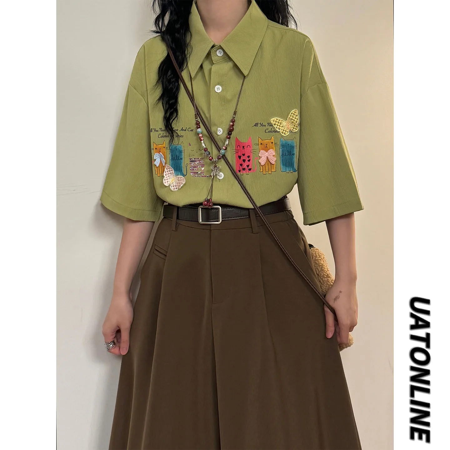 UATONLINE2026 Summer Street Style Loose Fit Graffiti Print Short Sleeve Women's Shirt Breathable Skin-Friendly
UATONLINE2026 Summer Street Style Loose Fit Graffiti Print Short Sleeve Women's Shirt Breathable Skin-Friendly