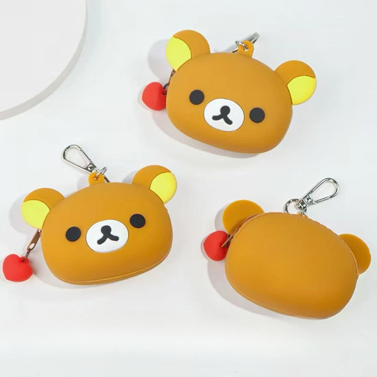 Cute rilakkuma silicone coin wallet cartoon student storage coin children's card bag portable Bluetooth headset storage bag
Cute rilakkuma silicone coin wallet cartoon student storage coin children's card bag portable Bluetooth headset storage bag