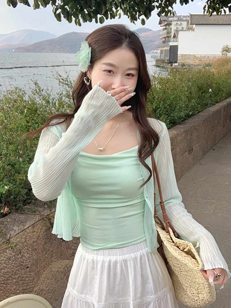 Women's Ice Silk Knitted Cardigan Summer Outerwear Air Conditioning Shirt with Strap Vest Thin Veil Short Jacket Korean Style...
Women's Ice Silk Knitted Cardigan Summer Outerwear Air Conditioning Shirt with Strap Vest Thin Veil Short Jacket Korean Style...