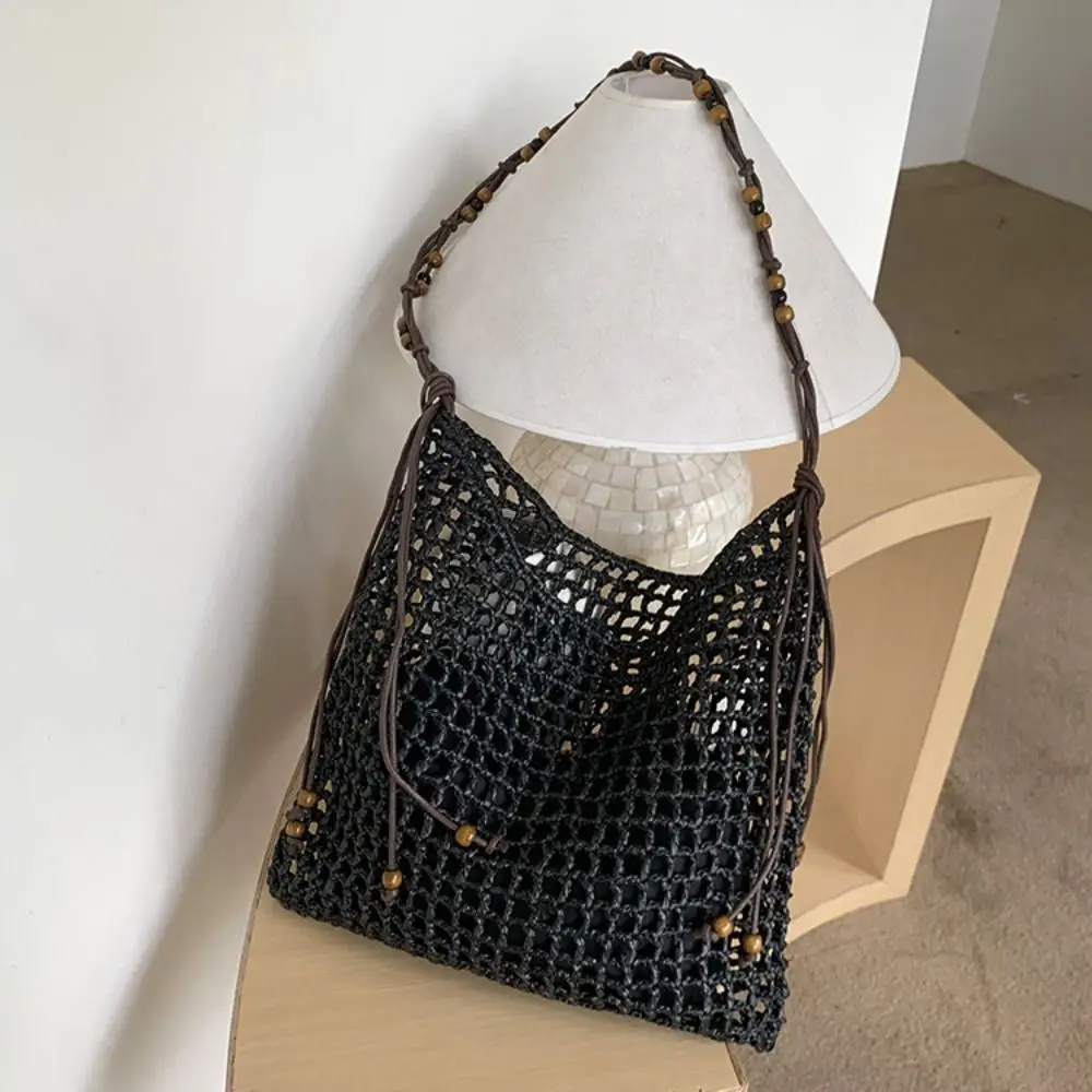 Пляжная сумка-тоут из соломы Лафит ручной работы с большим объемом, на шнурке, с деревянными бусинами, плетеная, для ношения под мышкой
Пляжная сумка-тоут из соломы Лафит ручной работы с большим объемом, на шнурке, с деревянными бусинами, плетеная, для ношения под мышкой