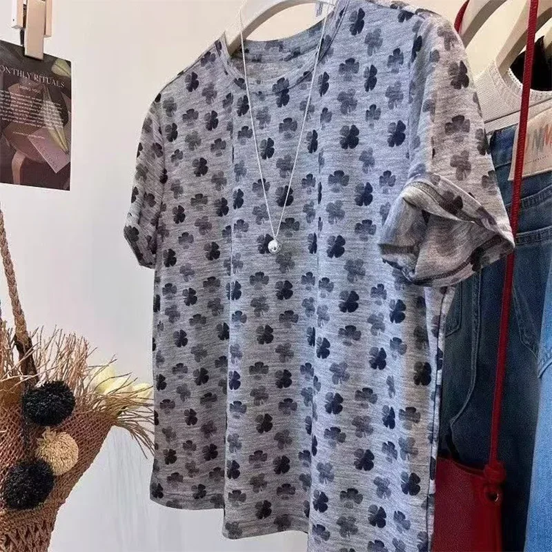 Large Sized 4-leaf Grass Printed Short Sleeves T-shirt for Women Summer New Loose Slimming Round Neck Top Fashion Women Clothing
Large Sized 4-leaf Grass Printed Short Sleeves T-shirt for Women Summer New Loose Slimming Round Neck Top Fashion Women Clothing