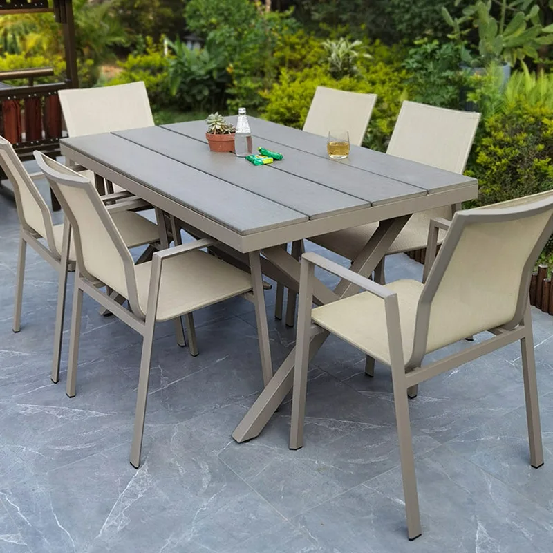 Outdoor table and chairs Courtyard villa Open-air terrace Garden Teslin mesh chair Rock slab table Outdoor leisure table and cha
Outdoor table and chairs Courtyard villa Open-air terrace Garden Teslin mesh chair Rock slab table Outdoor leisure table and cha