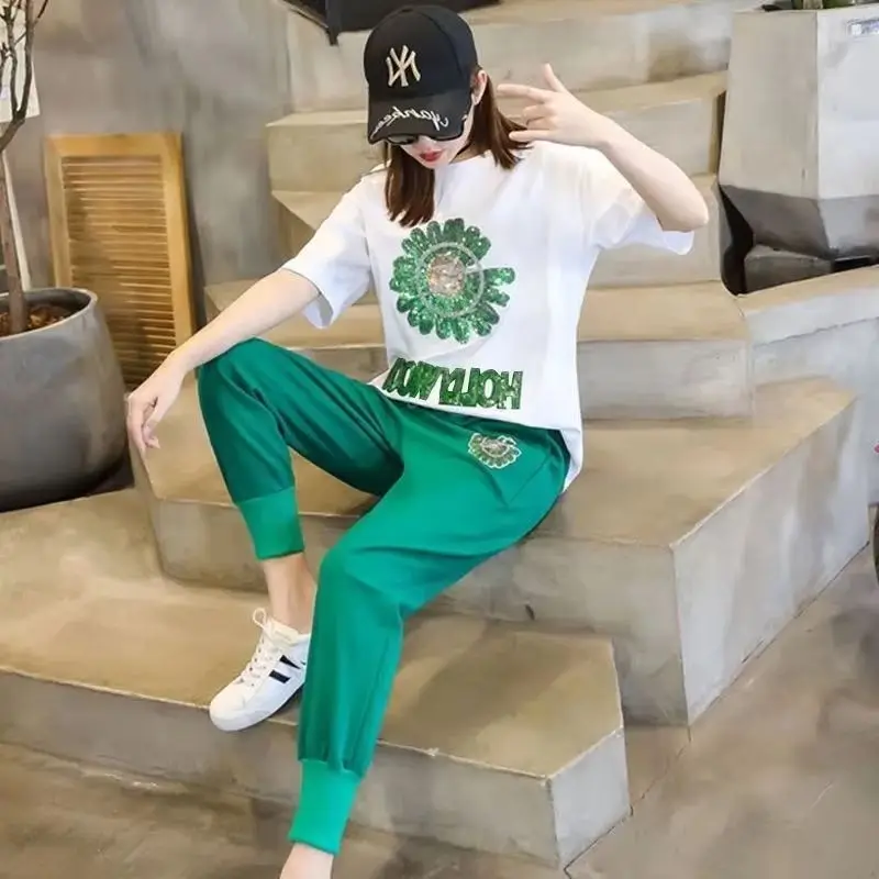 Women's Korean Leisure Sports Suit 2025 Spring and Summer New Fashion Loose Short Sleeve Corp Top Pants Two Piece Sets for Women
Women's Korean Leisure Sports Suit 2025 Spring and Summer New Fashion Loose Short Sleeve Corp Top Pants Two Piece Sets for Women