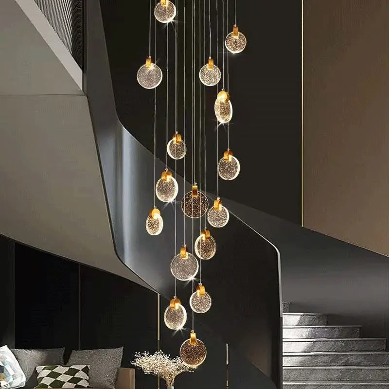 Villa stairs long chandelier light luxury simple duplex building engineering lights Internet celebrity loft empty staircase
Villa stairs long chandelier light luxury simple duplex building engineering lights Internet celebrity loft empty staircase