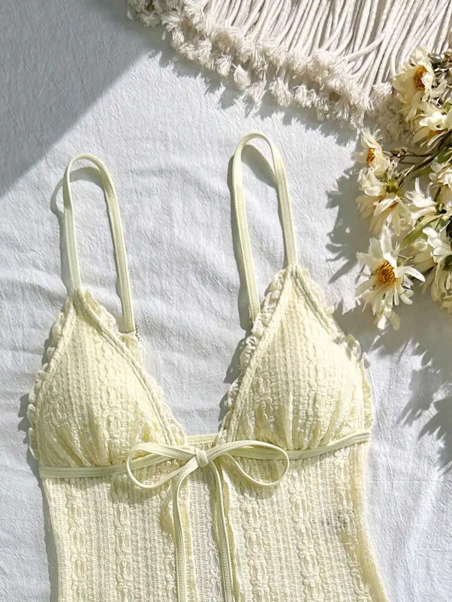 Minimalist Lace Solid Color Triangle Bikini Set With Tie Side And Adjustable Straps
Minimalist Lace Solid Color Triangle Bikini Set With Tie Side And Adjustable Straps