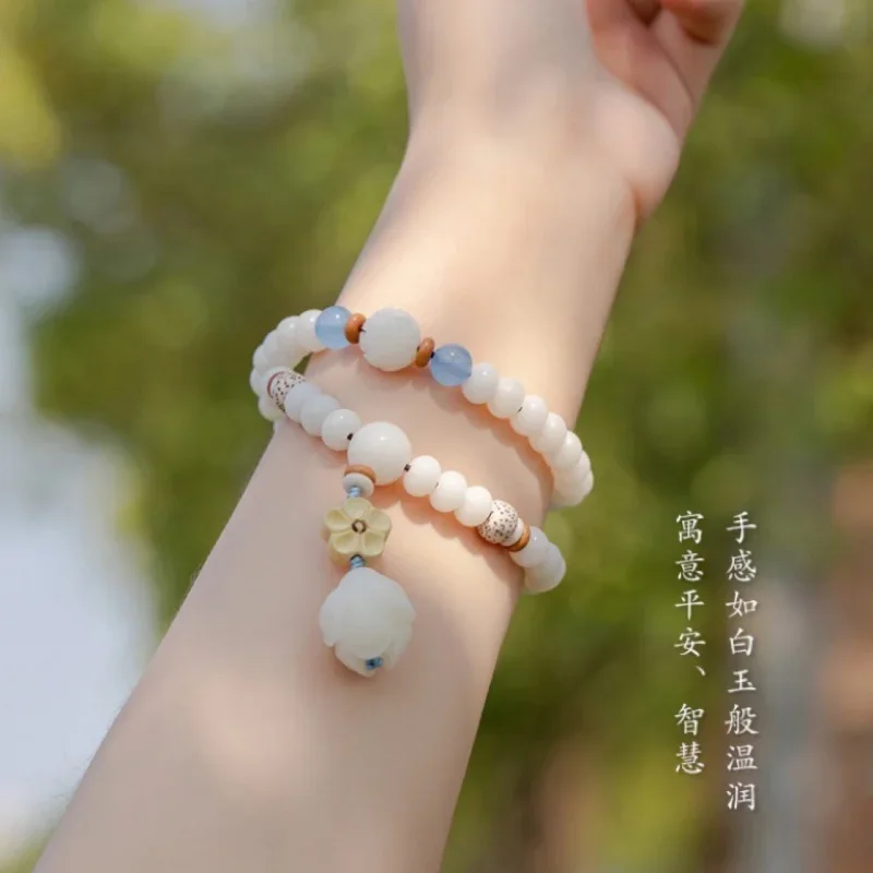 UMQ Plain Fragrance Elegant Natural White Jade Bodhi Root Double Ring Female Bracelet Ethnic Style Zen Clothes Accessor
UMQ Plain Fragrance Elegant Natural White Jade Bodhi Root Double Ring Female Bracelet Ethnic Style Zen Clothes Accessor