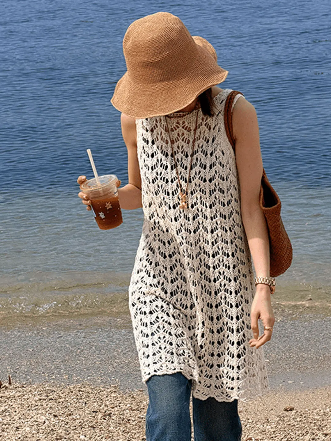 Women's Sleeveless Knitted Vest Hollow out Loose Fit Mid-Length Casual Style Summer Top Fashion Design Slimming Effect
Women's Sleeveless Knitted Vest Hollow out Loose Fit Mid-Length Casual Style Summer Top Fashion Design Slimming Effect