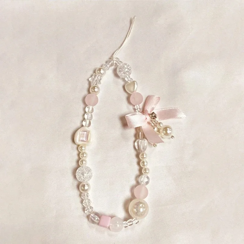 Korean Lovely Pink Bowknot White Beaded Phone Chain Charm Lanyard for IPhone Samsung Universal Accessories Jewelry Pendant
Korean Lovely Pink Bowknot White Beaded Phone Chain Charm Lanyard for IPhone Samsung Universal Accessories Jewelry Pendant