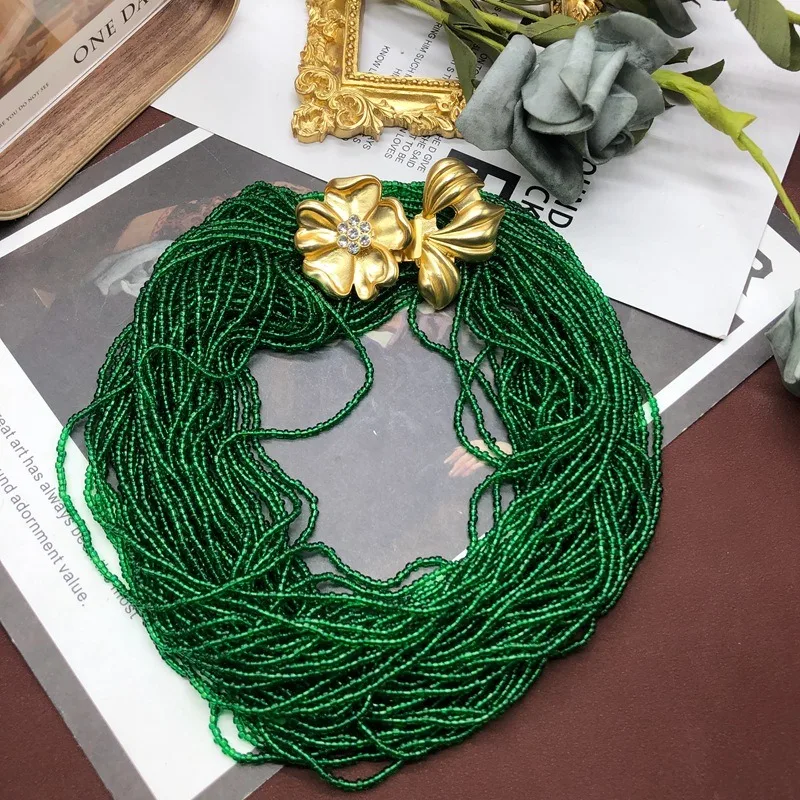 Medieval Necklace Multi-layer Green Millet Bead Sweater Chain with Diamond Flower Switch Pendant
Medieval Necklace Multi-layer Green Millet Bead Sweater Chain with Diamond Flower Switch Pendant