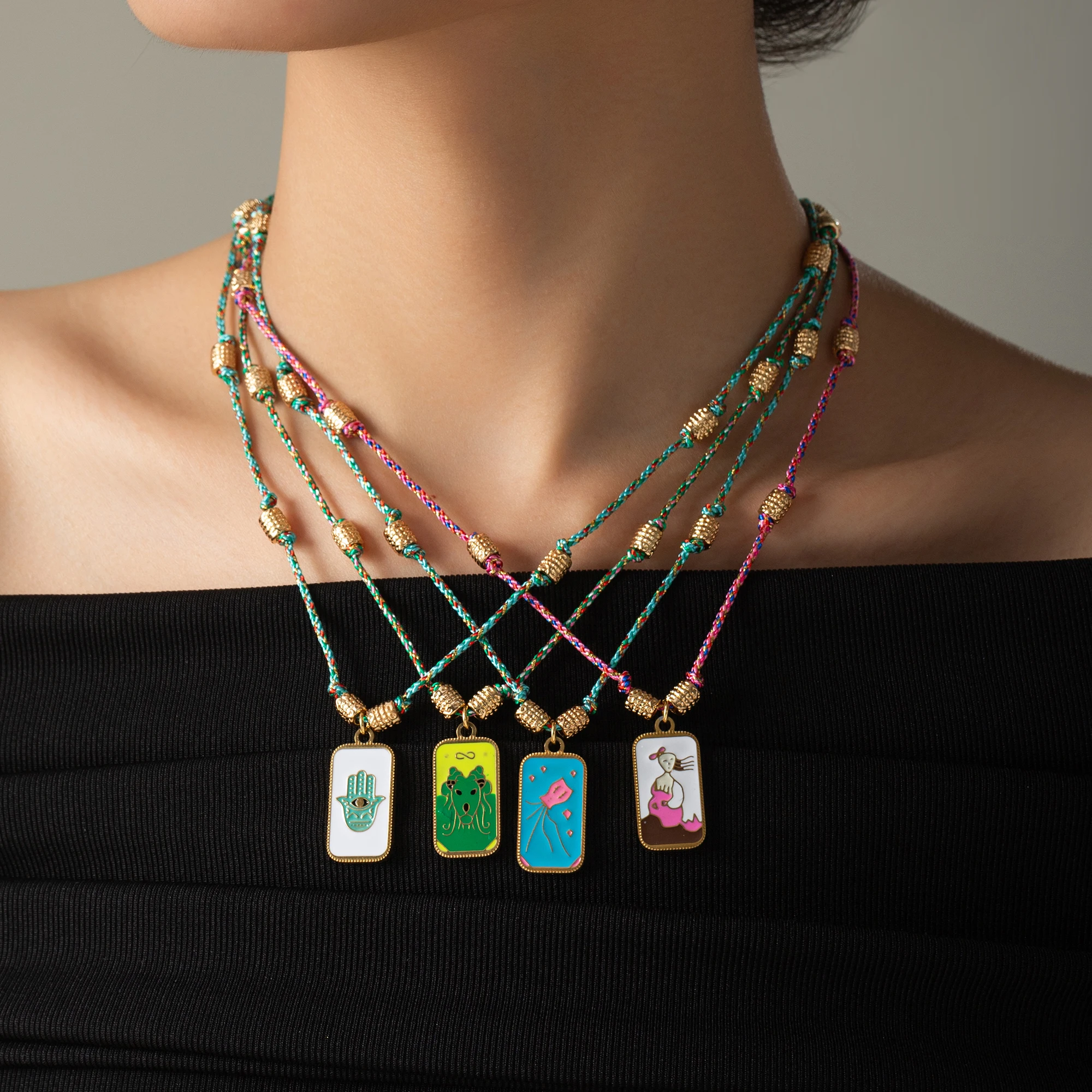 Stainless steel necklace colorful drip oil tarot card Bohemian rope handmade knotted women's jewelry
Stainless steel necklace colorful drip oil tarot card Bohemian rope handmade knotted women's jewelry