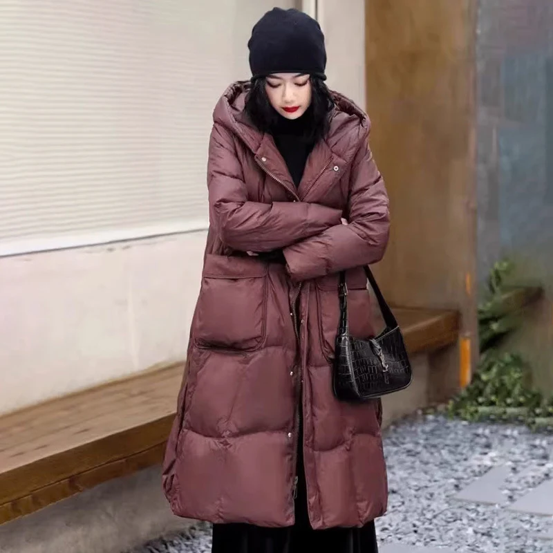 Casual Loose Autumn Winter Outwear with Hood A-lined Coat Big Pockets 2026 New Women White Duck Down Long Jacket
Casual Loose Autumn Winter Outwear with Hood A-lined Coat Big Pockets 2026 New Women White Duck Down Long Jacket