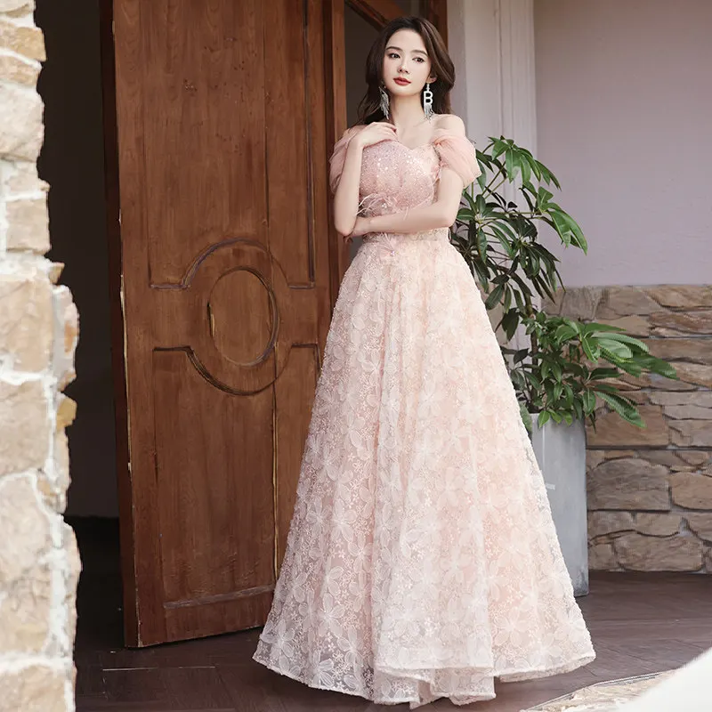 Fairy Pink Strapless Evening Dress 2026 Elegant Lace Embroidery A-Line Prom Gown for Wedding Party
Fairy Pink Strapless Evening Dress 2026 Elegant Lace Embroidery A-Line Prom Gown for Wedding Party